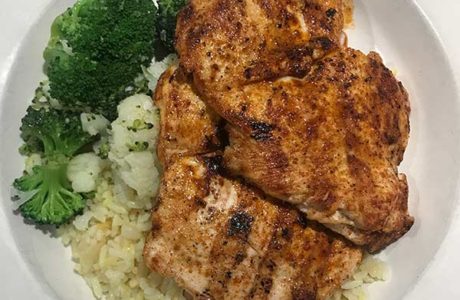 grilled chicken plate with rice and steamed vegetables