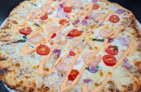 shrimp and aoili on a pizza
